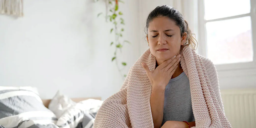 Woman with a sore throat