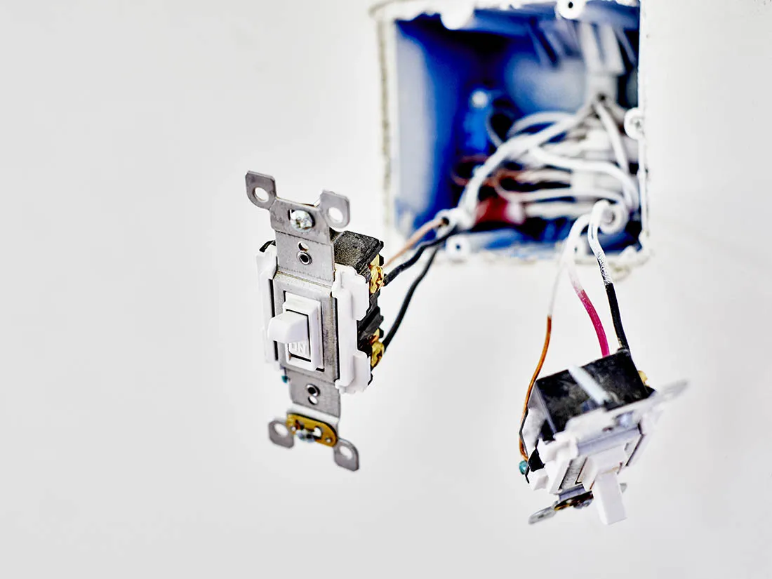 Light switch being installed