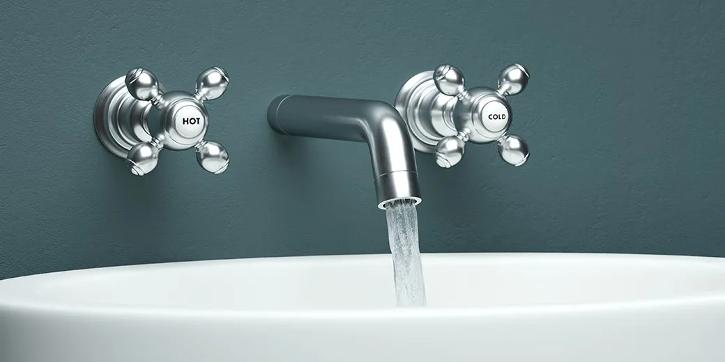 water coming out of a sink faucet